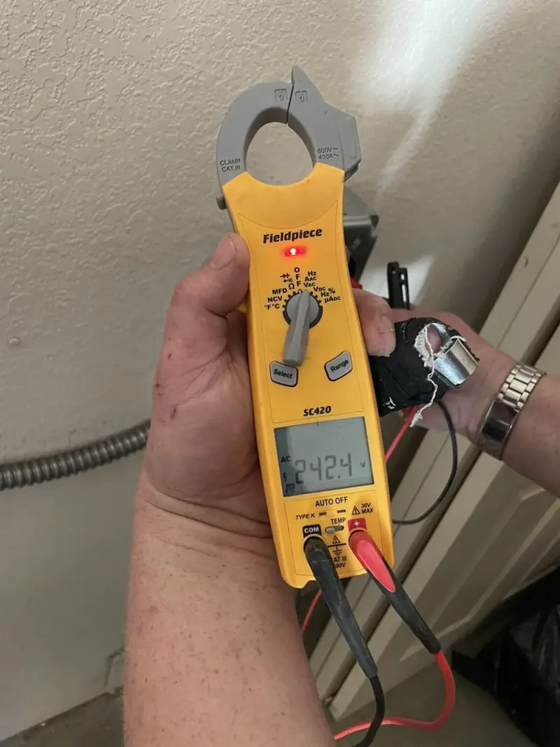Voltage testing with clamp meter during Electrical Installation Services in Albany